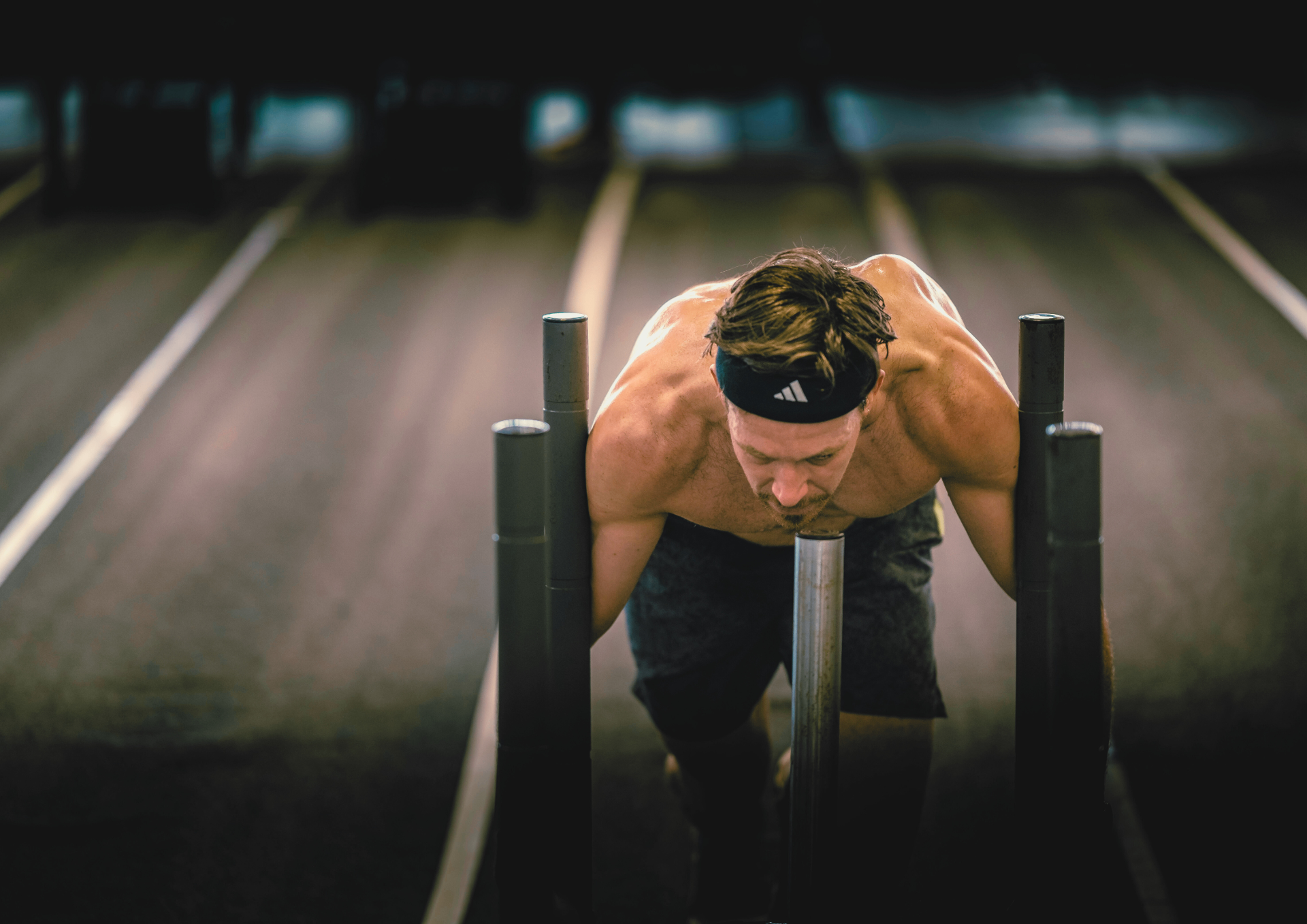 HYROX athlete performing sled push