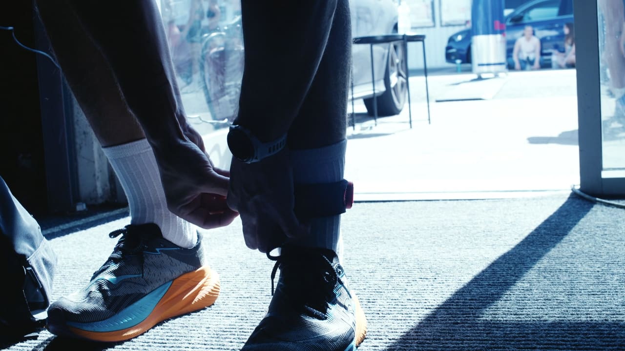 Athlete lacing up before a race