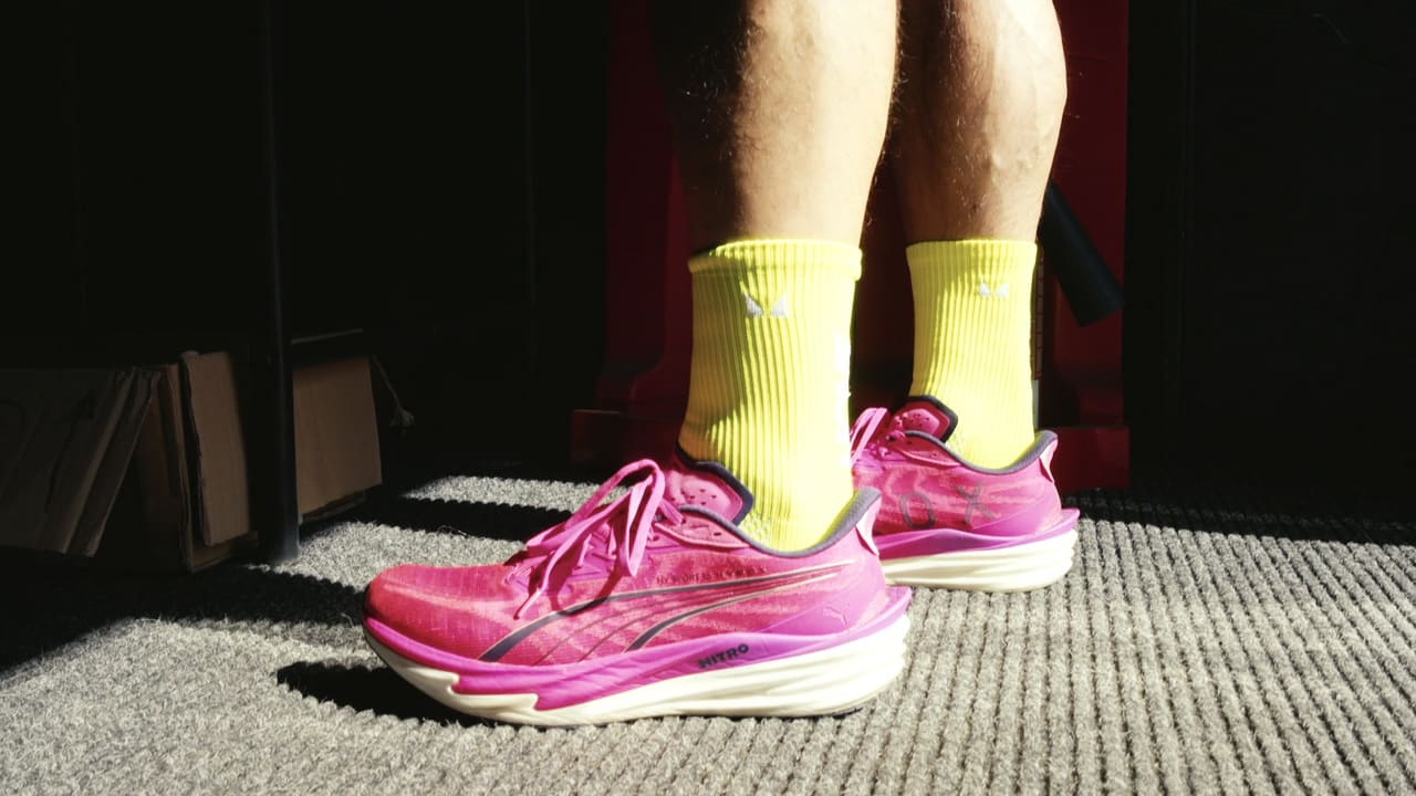 Athlete's trainers on the start line of a gym fitness race